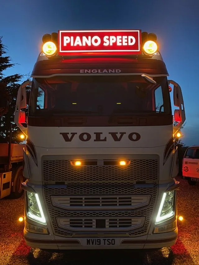 PianoSpeed Volvo piano transport truck on the road in London